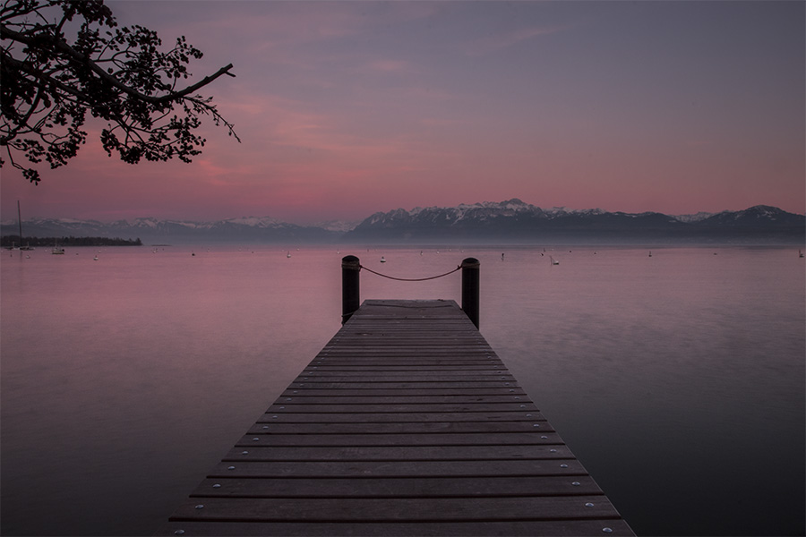 A boating dock during susnet in Morges Switzerland